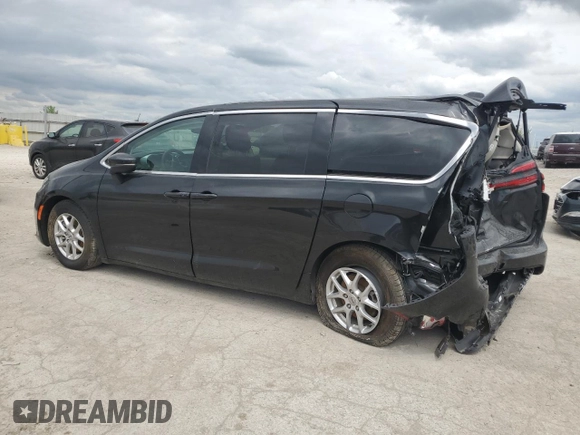 2023 Chrysler Pacifica Touring L with VIN 2C4RC1BG4PR621126, listed as a Copart auction lot 56694085 with 42,659 mi miles and Salvage title. Bid and sale history available at DreamBid. Image 2.