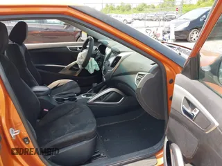 2012 Hyundai Veloster w/Gray Int с VIN KMHTC6AD0CU043402, выставлен на аукционе IAAI как лот 42406321 с пробегом 116 734 миль миль и . История ставок и продаж доступна на DreamBid. Изображение 5.