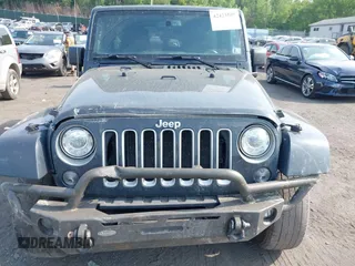 2017 Jeep Wrangler Unlimited Sahara with VIN 1C4BJWEG4HL518945, listed as a IAAI auction lot 42423505 with 155,828 mi miles and . Bid and sale history available at DreamBid. Image 6.