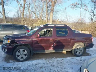 2009 Honda Ridgeline RTL with VIN 2HJYK16509H000803, listed as a IAAI auction lot 40993162 with 193,979 mi miles. Bid and sale history available at carsss.com. Image 14.