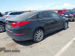 2015 Kia Optima EX z VIN 5XXGN4A75FG420329, wystawiony jako IAAI lot #42574401 z przebiegiem 223 816 mil mil oraz . Historia ofert i sprzedaży dostępna na DreamBid. Obrazek 4.