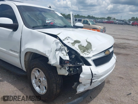 2007 Chevrolet Tahoe LTZ with VIN 1GNFC13J47J336516, listed as a IAAI auction lot 42545424 with 211,669 mi miles and . Bid and sale history available at DreamBid. Image 6.