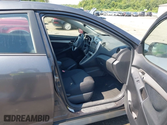 2009 Pontiac Vibe with VIN 5Y2SM67009Z462332, listed as a IAAI auction lot 42620669 with 164,227 mi miles and . Bid and sale history available at DreamBid. Image 5.