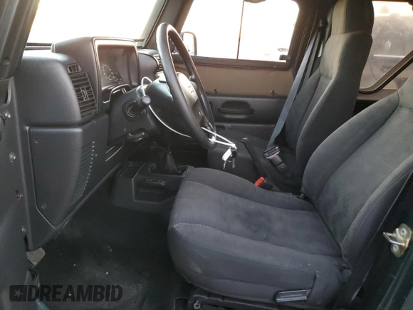 2005 Jeep Wrangler SE with VIN 1J4FA29155P363501, listed as a Copart auction lot 80388314 with 97,564 mi miles and Clean Title. Bid and sale history available at carsss.com. Image 7.