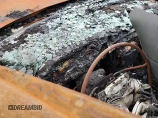 2001 Cadillac Eldorado ESC z VIN 1G6EL12Y81B110048, wystawiony jako Copart lot #69995914 z przebiegiem Nie podano mil oraz Nie do naprawy. Historia ofert i sprzedaży dostępna na DreamBid. Obrazek 9.
