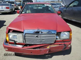 1990 Mercedes-Benz 300 CE with VIN WDBEA51D7LB137591, listed as a Copart auction lot 49811234 with 23,385 mi miles and Salvage Title. Bid and sale history available at carsss.com. Image 5.