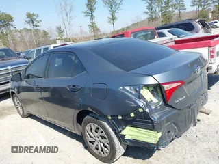 2019 Toyota Corolla L with VIN 2T1BURHE4KC134729, listed as a IAAI auction lot 41779629 with 240,685 mi miles. Bid and sale history available at carsss.com. Image 14.