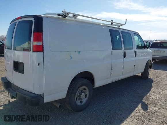 2013 Chevrolet Express Cargo Van with VIN 1GCWGGCA3D1117610, listed as a IAAI auction lot 41196391 with 201,350 mi miles. Bid and sale history available at carsss.com. Image 4.