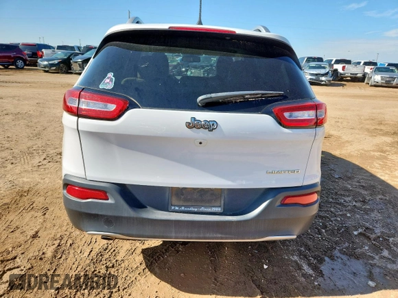 2016 Jeep Cherokee Limited with VIN 1C4PJLDB9GW329005, listed as a Copart auction lot 61939155 with 106,237 mi miles and Clean title. Bid and sale history available at DreamBid. Image 6.