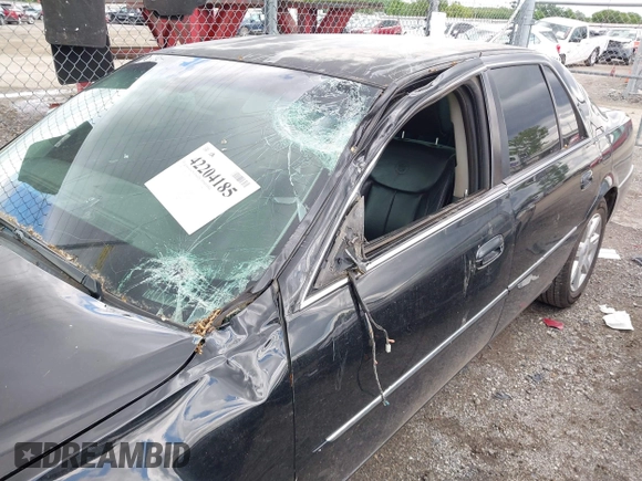 2008 Cadillac DTS 1SA z VIN 1G6KD57Y98U102801, wystawiony jako IAAI lot #42204185 z przebiegiem 152 990 mil mil oraz . Historia ofert i sprzedaży dostępna na DreamBid. Obrazek 12.