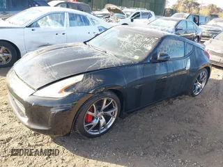 2014 Nissan 370Z with VIN JN1AZ4EH8EM636717, listed as a IAAI auction lot 40751494 with Not Provided miles and . Bid and sale history available at DreamBid. Image 2.
