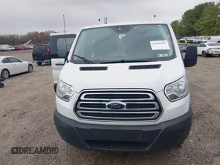 2019 Ford Transit z VIN 1FTYR1ZM4KKB00758, wystawiony jako IAAI lot #42006896 z przebiegiem 67 270 mil mil oraz . Historia ofert i sprzedaży dostępna na DreamBid. Obrazek 12.