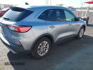 2022 Ford Escape SE z VIN 1FMCU0G6XNUB31007, wystawiony jako IAAI lot #42510666 z przebiegiem 106 236 mil mil oraz . Historia ofert i sprzedaży dostępna na DreamBid. Obrazek 4.