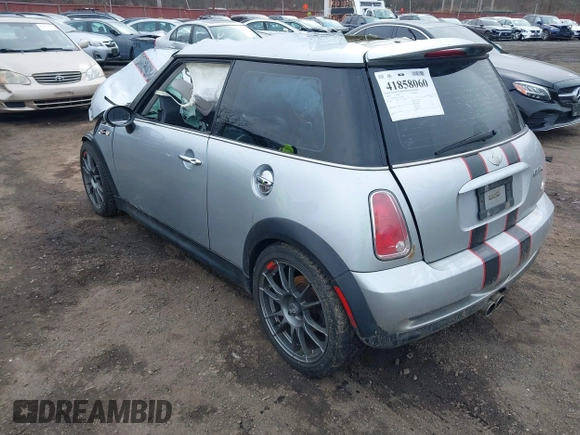 2006 MINI Hardtop S with VIN WMWRE33546TL23876, listed as a IAAI auction lot 41858060 with 146,359 mi miles and . Bid and sale history available at DreamBid. Image 3.
