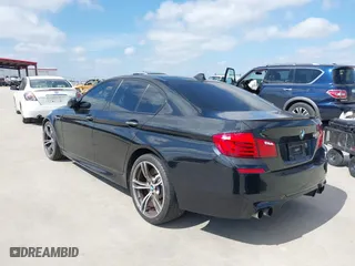 2013 BMW M5 with VIN WBSFV9C54DD095547, listed as a IAAI auction lot 41601733 with 1 mi miles. Bid and sale history available at carsss.com. Image 3.