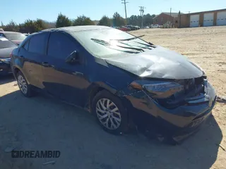 2018 Toyota Corolla L z VIN 5YFBURHE1JP820015, wystawiony jako IAAI lot #41677587 z przebiegiem 152 809 mil mil oraz . Historia ofert i sprzedaży dostępna na DreamBid. Obrazek 1.