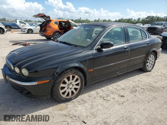 2003 Jaguar X-Type 2.5L Manual z VIN SAJEA51D73XD21289, wystawiony jako Copart lot #59583194 z przebiegiem 70 333 mil mil oraz Czysty tytuł • Clean title. Historia ofert i sprzedaży dostępna na DreamBid. Obrazek 1.