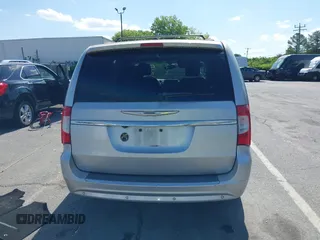 2012 Chrysler Town & Country Touring L with VIN 2C4RC1CG1CR245008, listed as a IAAI auction lot 41951680 with 98,656 mi miles and . Bid and sale history available at DreamBid. Image 16.