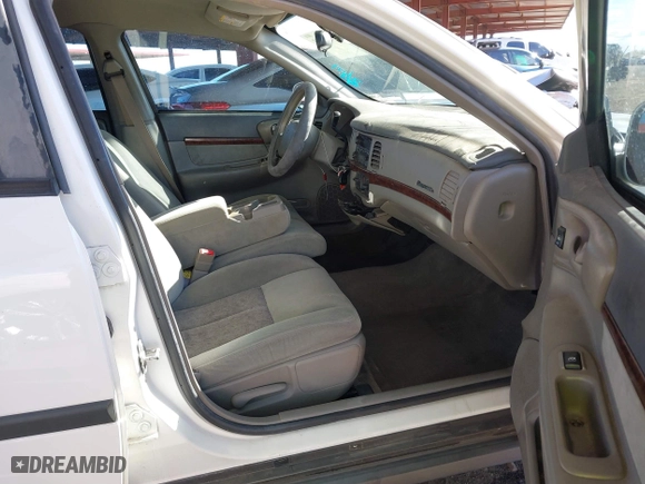 2004 Chevrolet Impala with VIN 2G1WF52E449445621, listed as a IAAI auction lot 41706405 with 104,563 mi miles. Bid and sale history available at carsss.com. Image 5.