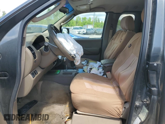 2005 Nissan Frontier LE z VIN 1N6AD06W45C406094, wystawiony jako Copart lot #54011914 z przebiegiem 165 293 mil mil oraz Szkoda całkowita • Salvage title. Historia ofert i sprzedaży dostępna na DreamBid. Obrazek 7.