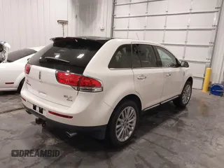 2011 Lincoln MKX with VIN 2LMDJ8JKXBBJ34612, listed as a IAAI auction lot 41775743 with 137,810 mi miles and . Bid and sale history available at DreamBid. Image 4.