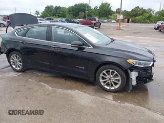 2019 Ford Fusion Hybrid SEL with VIN 3FA6P0MU1KR202860, listed as a IAAI auction lot 41983299 with 133,671 mi miles. Bid and sale history available at carsss.com. Image 1.