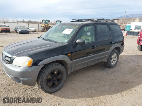 2001 Mazda Tribute LX with VIN 4F2CU08191KM27990, listed as a IAAI auction lot 41487001 with 209,394 mi miles and . Bid and sale history available at carsss.com. Image 2.