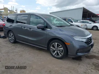2023 Honda Odyssey Touring with VIN 5FNRL6H81PB047495, listed as a IAAI auction lot 41919967 with Not Provided miles and . Bid and sale history available at DreamBid. Image 1.