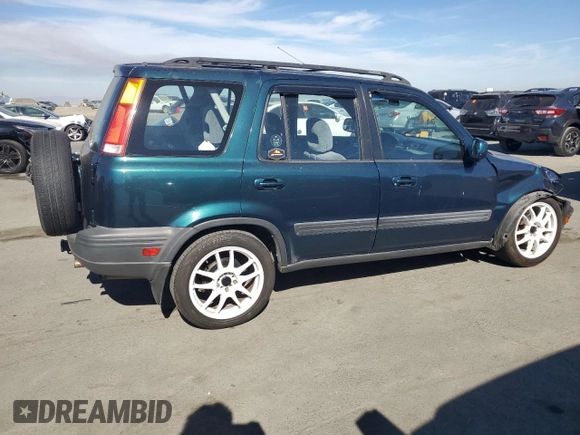 1998 Honda CR-V EX with VIN JHLRD1860WC055679, listed as a Copart auction lot 77705944 with 285,384 mi miles and Salvage Title. Bid and sale history available at carsss.com. Image 3.