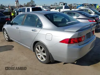 2004 Acura TSX w/Navigation with VIN JH4CL96944C002982, listed as a IAAI auction lot 41855710 with 165,129 mi miles. Bid and sale history available at carsss.com. Image 3.