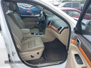 2013 Jeep Grand Cherokee Overland with VIN 1C4RJECGXDC621227, listed as a IAAI auction lot 42098042 with 194,232 mi miles and . Bid and sale history available at DreamBid. Image 5.