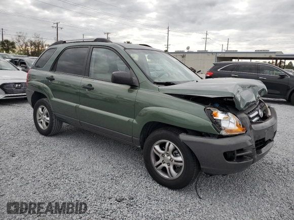 2005 Kia Sportage LX with VIN KNDJF723657074234, listed as a Copart auction lot 86792794 with 97,548 mi miles and Salvage Title. Bid and sale history available at carsss.com. Image 4.