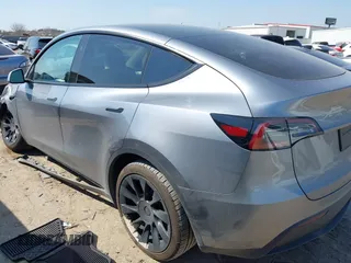 2024 Tesla Model Y Long Range with VIN 7SAYGDEE5RA290907, listed as a IAAI auction lot 41705170 with 4,099 mi miles. Bid and sale history available at carsss.com. Image 3.