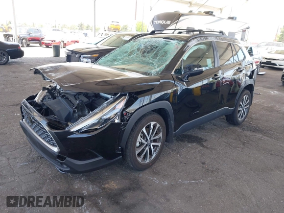 2023 Toyota Corolla Cross XLE with VIN 7MUDAAAG8PV072030, listed as a IAAI auction lot 42397573 with 6,584 mi miles and . Bid and sale history available at DreamBid. Image 16.