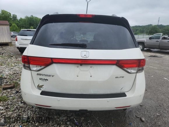 2014 Honda Odyssey Touring with VIN 5FNRL5H95EB083772, listed as a Copart auction lot 56713525 with 215,833 mi miles and Salvage title. Bid and sale history available at DreamBid. Image 6.