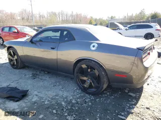 2015 Dodge Challenger SXT Plus with VIN 2C3CDZBG8FH704679, listed as a Copart auction lot 49155465 with 102,244 mi miles and Salvage Title. Bid and sale history available at carsss.com. Image 2.