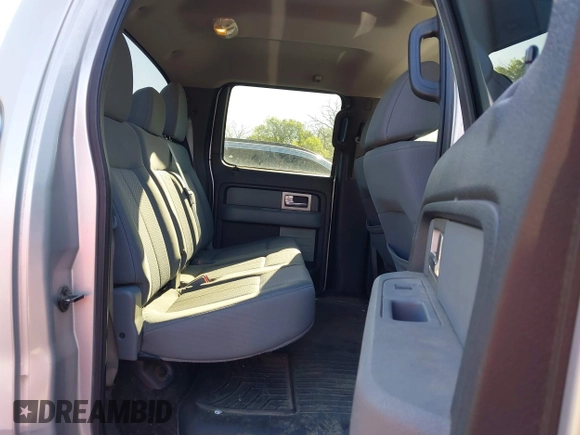 2011 Ford F-150 XLT with VIN 1FTFW1ETXBFB77415, listed as a IAAI auction lot 42048378 with 202,620 mi miles. Bid and sale history available at carsss.com. Image 8.