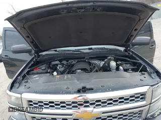 2015 Chevrolet Silverado 1500 LT with VIN 1GCVKREC5FZ224506, listed as a IAAI auction lot 41780803 with 104,960 mi miles and . Bid and sale history available at DreamBid. Image 10.