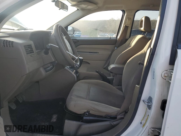 2007 Jeep Compass Sport with VIN 1J8FF47W07D199198, listed as a Copart auction lot 52092675 with 131,346 mi miles and Salvage Title. Bid and sale history available at carsss.com. Image 7.
