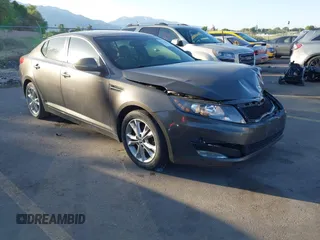 2011 Kia Optima EX z VIN KNAGN4A72B5162010, wystawiony jako IAAI lot #42373787 z przebiegiem 132 146 mil mil oraz . Historia ofert i sprzedaży dostępna na DreamBid. Obrazek 1.