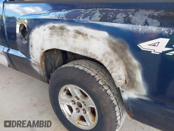 2005 Dodge Dakota SLT with VIN 1D7HW42N05S365877, listed as a IAAI auction lot 40418188 with 280,423 mi miles and . Bid and sale history available at DreamBid. Image 6.