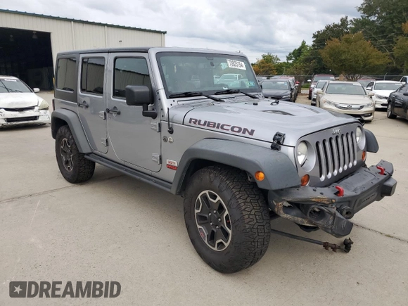 2013 Jeep Wrangler Unlimited Rubicon 10th Anniversary z VIN 1C4HJWFG3DL703331, wystawiony jako Copart lot #70823154 z przebiegiem 148 860 mil mil oraz Szkoda całkowita • Salvage title. Historia ofert i sprzedaży dostępna na DreamBid. Obrazek 4.