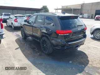 2014 Jeep Grand Cherokee Overland with VIN 1C4RJFCT8EC106005, listed as a IAAI auction lot 41989721 with 148,469 mi miles and . Bid and sale history available at DreamBid. Image 3.