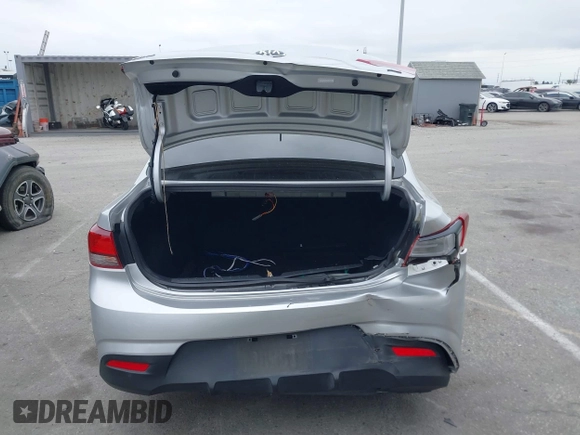 2020 Kia Rio LX with VIN 3KPA24AD7LE313579, listed as a IAAI auction lot 41884205 with 112,586 mi miles and . Bid and sale history available at DreamBid. Image 16.