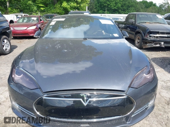 2014 Tesla Model S P85D with VIN 5YJSA1H29EFP63032, listed as a IAAI auction lot 42132145 with Not Provided miles and . Bid and sale history available at DreamBid. Image 11.