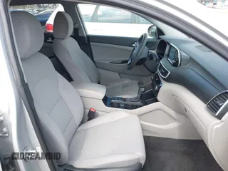 2019 Hyundai Tucson Value with VIN KM8J3CA46KU962082, listed as a IAAI auction lot 42160288 with 92,887 mi miles and . Bid and sale history available at DreamBid. Image 5.