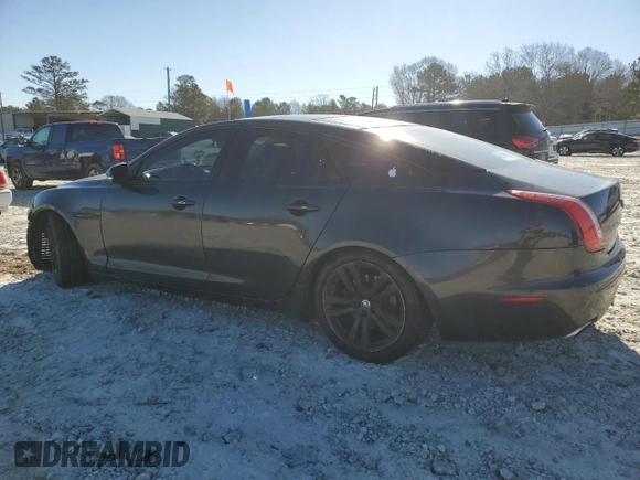2012 Jaguar XJ with VIN SAJWA1CB1CLV31450, listed as a Copart auction lot 46883875 with 150,268 mi miles and Salvage Title. Bid and sale history available at DreamBid. Image 2.
