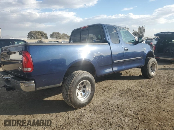 2003 Ford F-150 XL with VIN 1FTRX17L13NA95202, listed as a Copart auction lot 87766385 with 124,961 mi miles and Salvage Title. Bid and sale history available at carsss.com. Image 3.