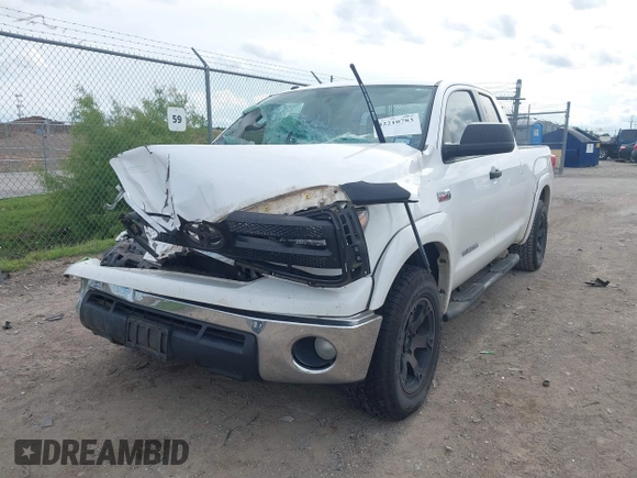 2012 Toyota Tundra with VIN 5TFUW5F16CX225421, listed as a IAAI auction lot 42210783 with 207,025 mi miles and . Bid and sale history available at DreamBid. Image 17.