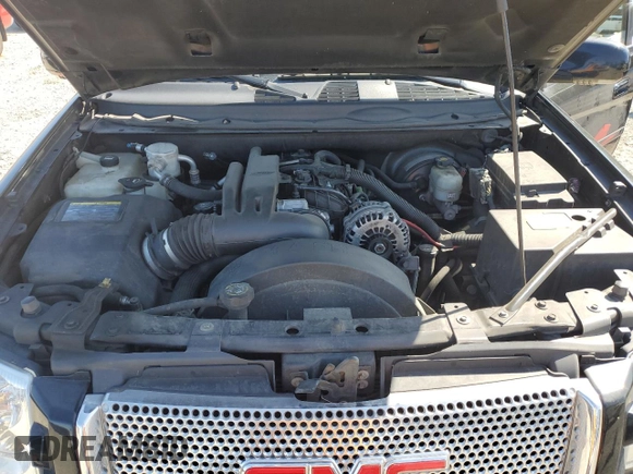 2006 GMC Envoy Denali with VIN 1GKET63M562300813, listed as a Copart auction lot 54349635 with 115,480 mi miles and Salvage Title. Bid and sale history available at DreamBid. Image 12.